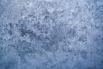 Fototapeta na wymiar Frosty pattern on winter glass pane. 