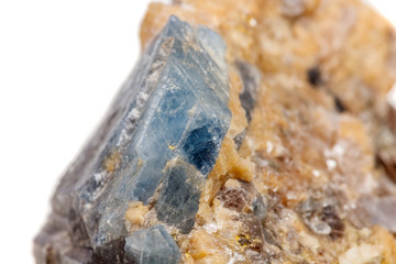 Macro mineral stone Corundum in rock a white background