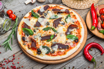 Pizza with tomatoes, mozzarella cheese. Delicious italian pizza