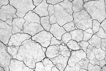 White dried and cracked earth background texture, Close-up of dry fissure ground, fracture surface