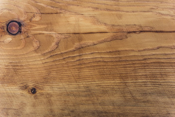 Brown wooden board with a pattern background texture, a wooden floor, a fence of natural wood, a surface of a teak wood background for design and decoration