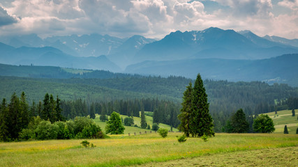 Cloudy Tatra mountains at sunset in summer