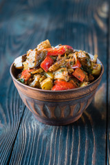 Bowl of ratatouille on the wooden table