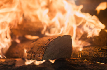 Logs on fire in a home fireplace