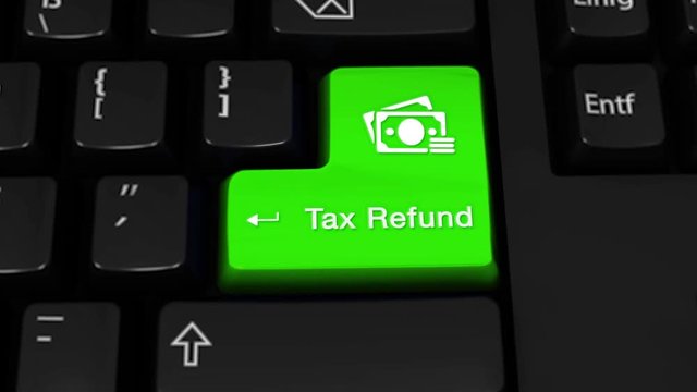 20.Tax Refund Rotation Motion On Green Enter Button On Modern Computer Keyboard with Text and icon Labeled. Selected Focus Key is Pressing Animation. Business Tax Accounting