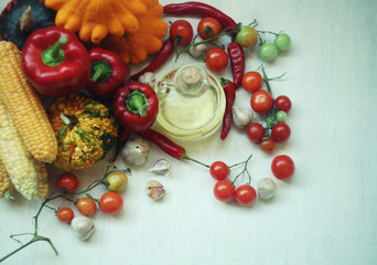 Naklejka na ściany i meble Organic Vegetables autumn harvest over white rustic background/ healthy organic food concept