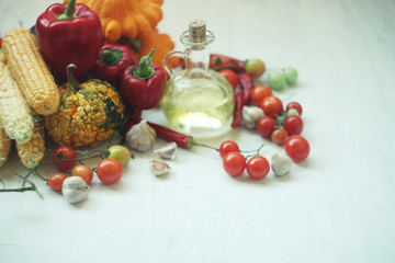 Organic Vegetables autumn harvest over white rustic background/ healthy organic food concept