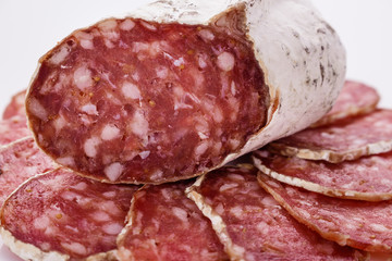 Saucisson sec delicious french salami on a white background