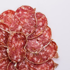 Saucisson sec delicious french salami on a white background