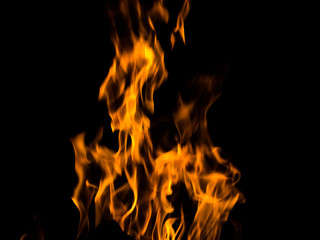 bright fire on a black background at night