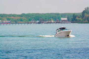 Obraz premium Motor boat on the river.