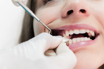 Patient with a gauze in mouth