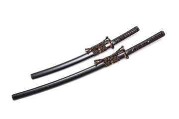 Brown leather cord tie on grip  Japanese sword and black scabbard with steel fitting isolated in white background.