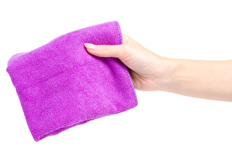 Microfiber purple textile in hand on white background isolation