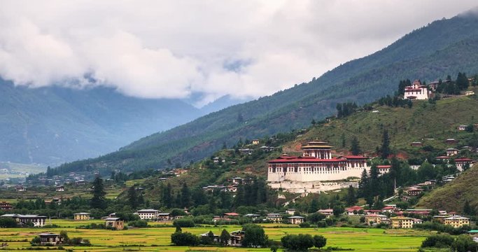 Looking out over the city of Paro in Bhutan. The Rinpung Dzong can be seen. Time Lapse.