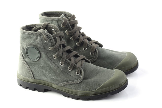 Green military style sneakers on white