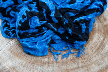 Black and blue kerchief on a stump