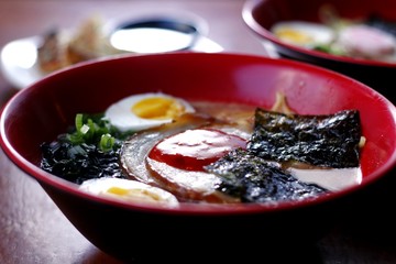 Bowl of freshly cooked pork Tan Tan Men Ramen noodles soup