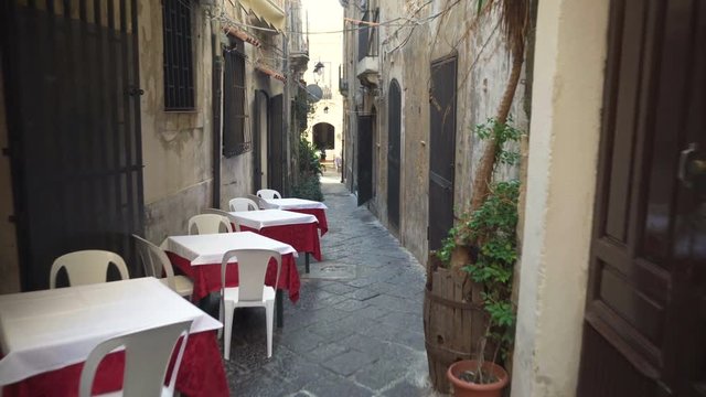 Italy, restaurant in typical street, Sicily Syracuse