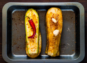 Eggplant and zucchini with spices for grilling on iron baking tray, isolated.Banner. The concept of healthy eating and delicious food.Top view, copy space, flat lay,closeup