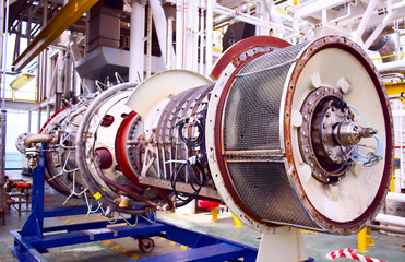 The exchange gas turbine engine used in offshore oil and gas central processing platform. © Pongpob