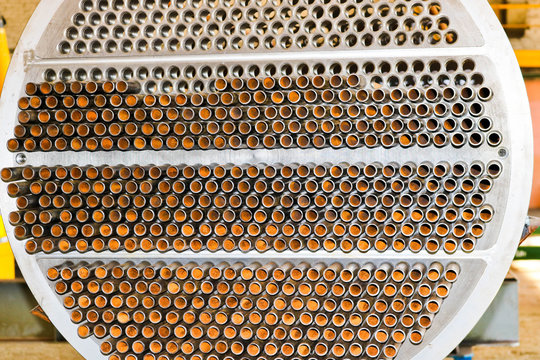 Production of a large tube bundle for a shell-and-tube heat exchanger in an industrial production room of a shop with equipment at an oil refinery, petrochemical, chemical plant, enterprise