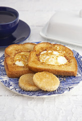 A Classic Meal Eggs Fried in the Center of Toast for Breakfast