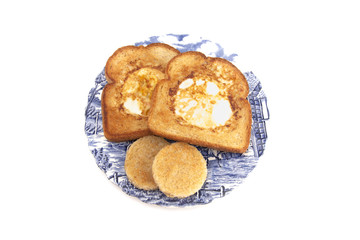 A Classic Meal Eggs Fried in the Center of Toast for Breakfast
