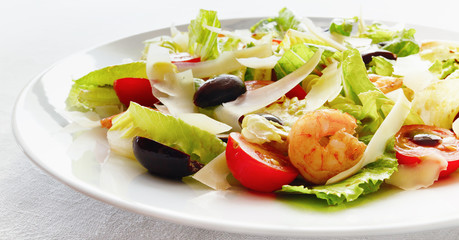 tomatoes, fried in garlic oil shrimps, kalamata olives, and parmesan dressed with olive oil, modena vinegar and cream