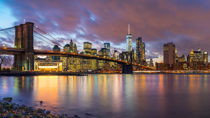 Brooklyn bridge and Manhattan after sunset, New York City