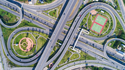 Aerial view highway road network circle or intersection traffic. Can use for import export or transportation concept.