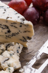 delicious blue cheese on wooden rustic background