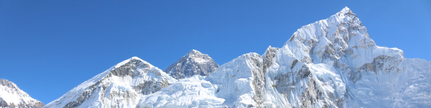 Amazing Shot Panoramic View Of Nepalese Himalayas Mountain Peaks Covered With White Snow Attract Many Climbers, Some Of Them Highly Experienced Mountaineers