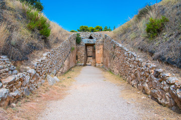 Fototapeta na wymiar Entrance of the tomb of Aegisthus or Aigistos of the citadel of Mycenae. Archaeological site of Mycenae in Peloponnese Greece