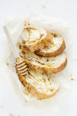 Wheat toast for Breakfast with butter and honey on white background. Closeup