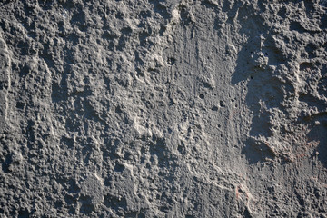 Gray textured concrete wall. Interesting background. Grunge. texture