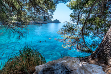 MARATEA, BASILIKATA, ITALY - A place in the shade to relax, on a sunny day, on the rocky coast of the Tyrrhenian sea coast in the south of Italy at Maratea.