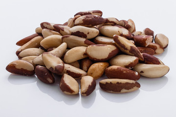 brazil nut on a white acrylic background