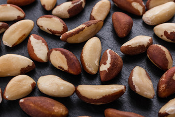 brazil nut on a dark stone background