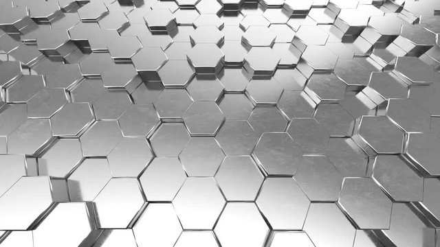Abstract looping motion background texture of metallic hexagons.