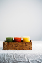 Fototapeta na wymiar Colorful smoothies in glass with fresh tropical fruit and superfoods