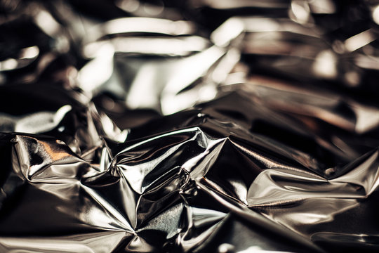 Full frame take of a sheeT of crumpled silver aluminum foil
