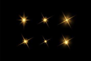 Vector glowing light effects set. Stars bursts with sparkles elements for any image. Transparent stars.