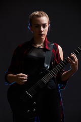 Blonde woman rocker guitarist black dark scene
