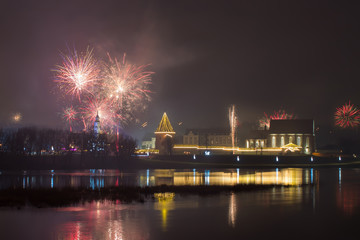 Fototapeta na wymiar Festive fireworks in the city. Kaunas, Lithuania.
