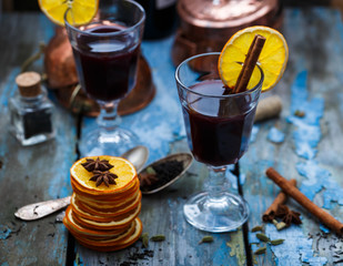 Glass of grog close view, rustic style, dark photo