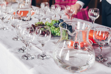 Buffet table with water and fruits