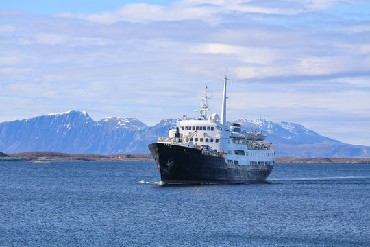 Old travler MS Lofoten arrives Bronnoysund harbor in Northern Norway
