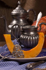 Pumpkin cooking on the kitchen table. Vintage style