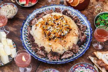Iranian pilaf with tahdig and lamb close view